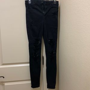 American Eagle black jeans with holes at knees size 2 long.